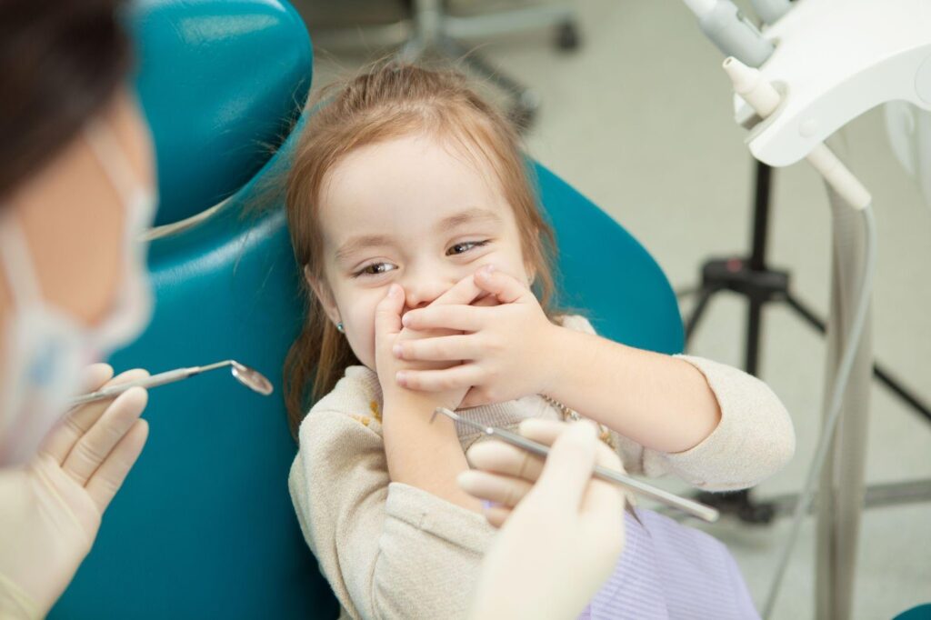 Child displaying dental anxiety