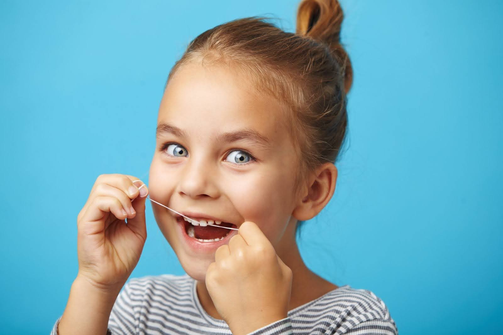 Preventing gingivitis in children by flossing
