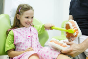 Why pediatric dentists do not allow parents in the room - child enjoying time at the pediatric dentistry.