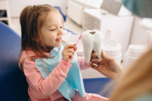 Why pediatric dentists do not allow parents in the room - child enjoying time at the pediatric dentistry.