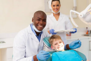 Why pediatric dentists do not allow parents in the room - professional medical team with a young patient.